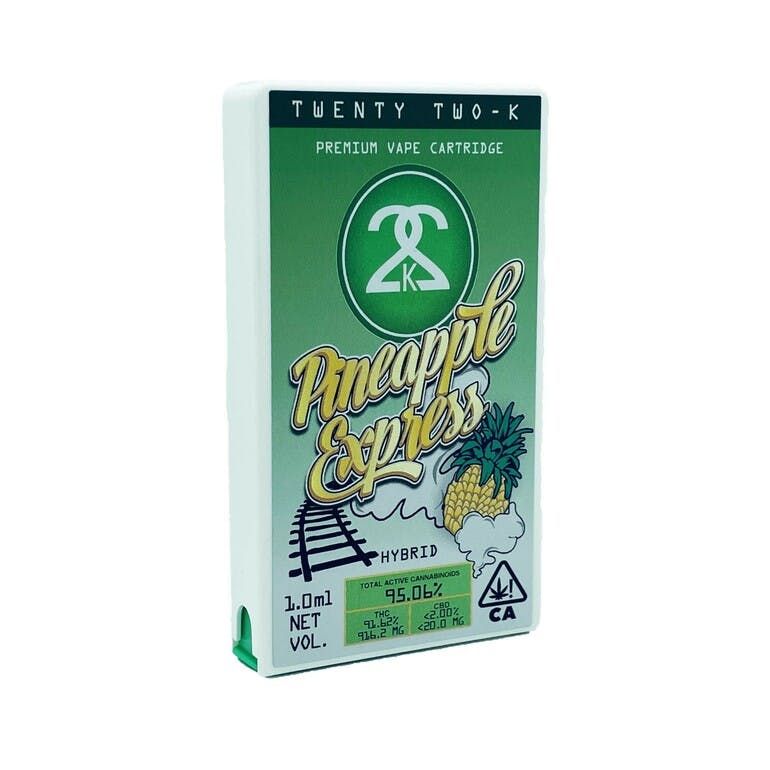 22K Pineapple Express vape cartridge beside its 22K retail packaging