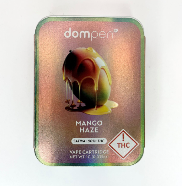 Dom Pen Mango Haze vape cartridge beside its Dom Pen retail packaging