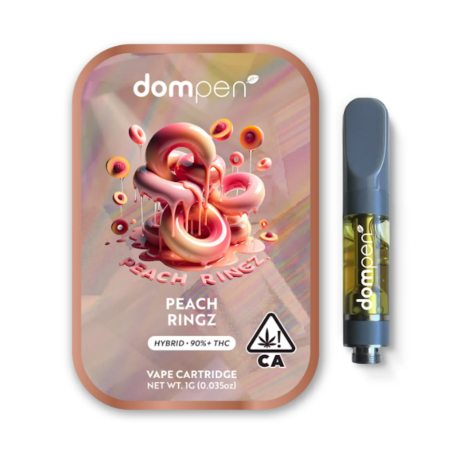 Dom Pen Peach Ringz vape cartridge beside its Dom Pen retail packaging